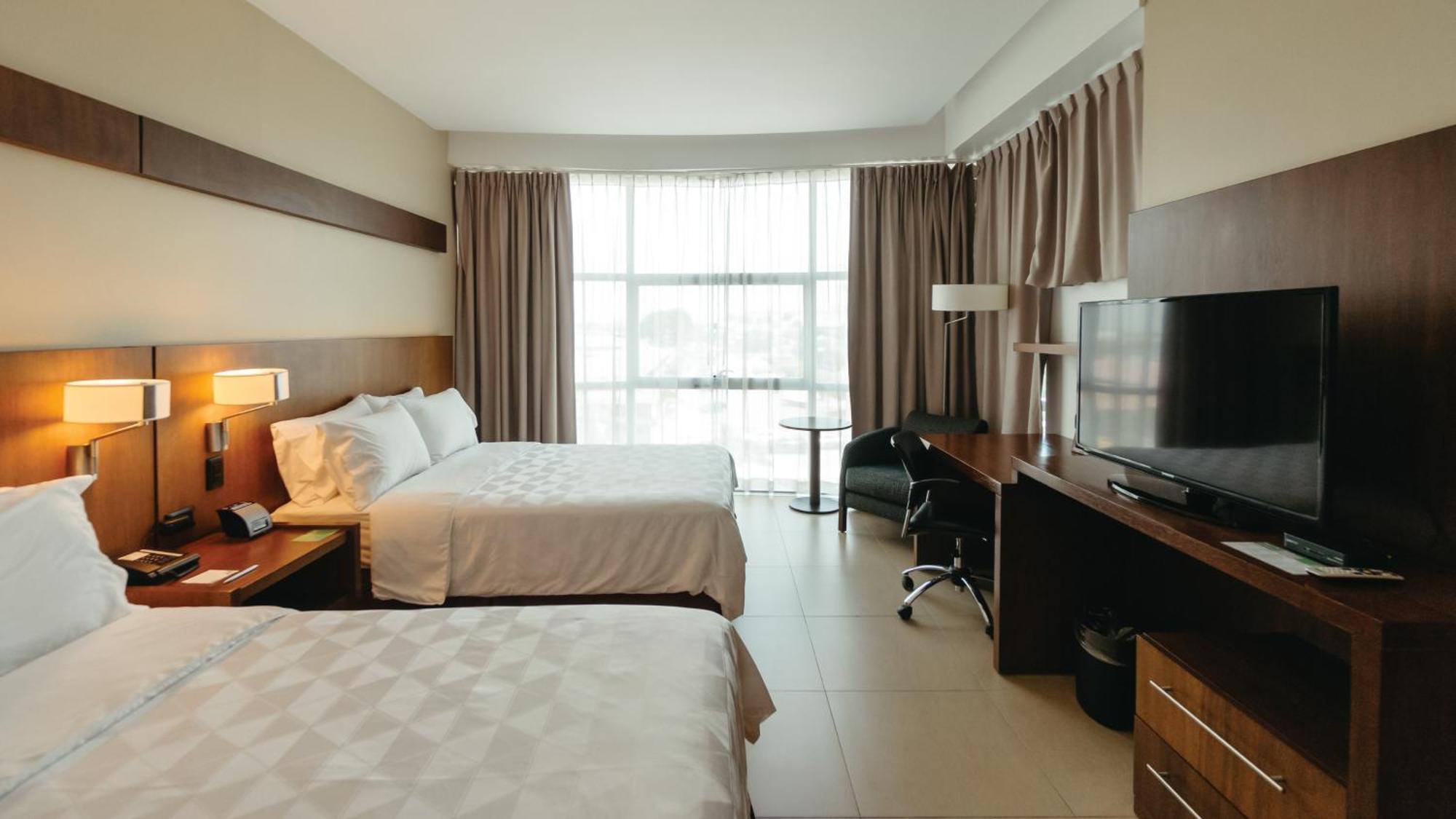 Holiday Inn Guayaquil Airport By Ihg Kültér fotó A room at the hotel